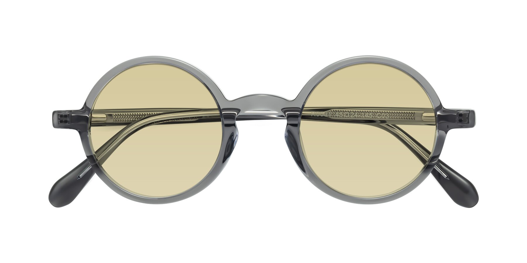 Folded Front of Juno in Transparent Gray with Light Champagne Tinted Lenses