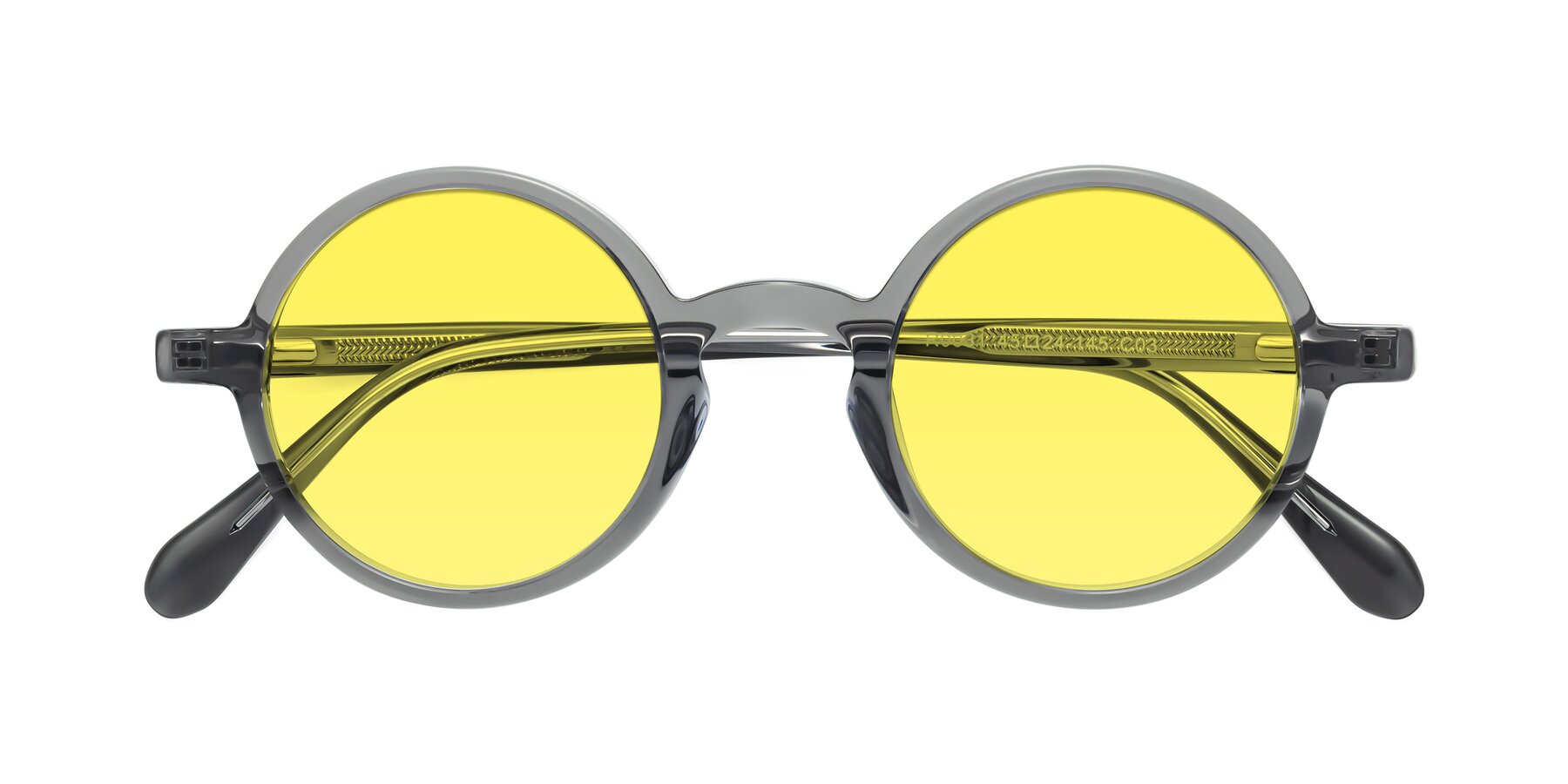 Folded Front of Juno in Transparent Gray with Medium Yellow Tinted Lenses