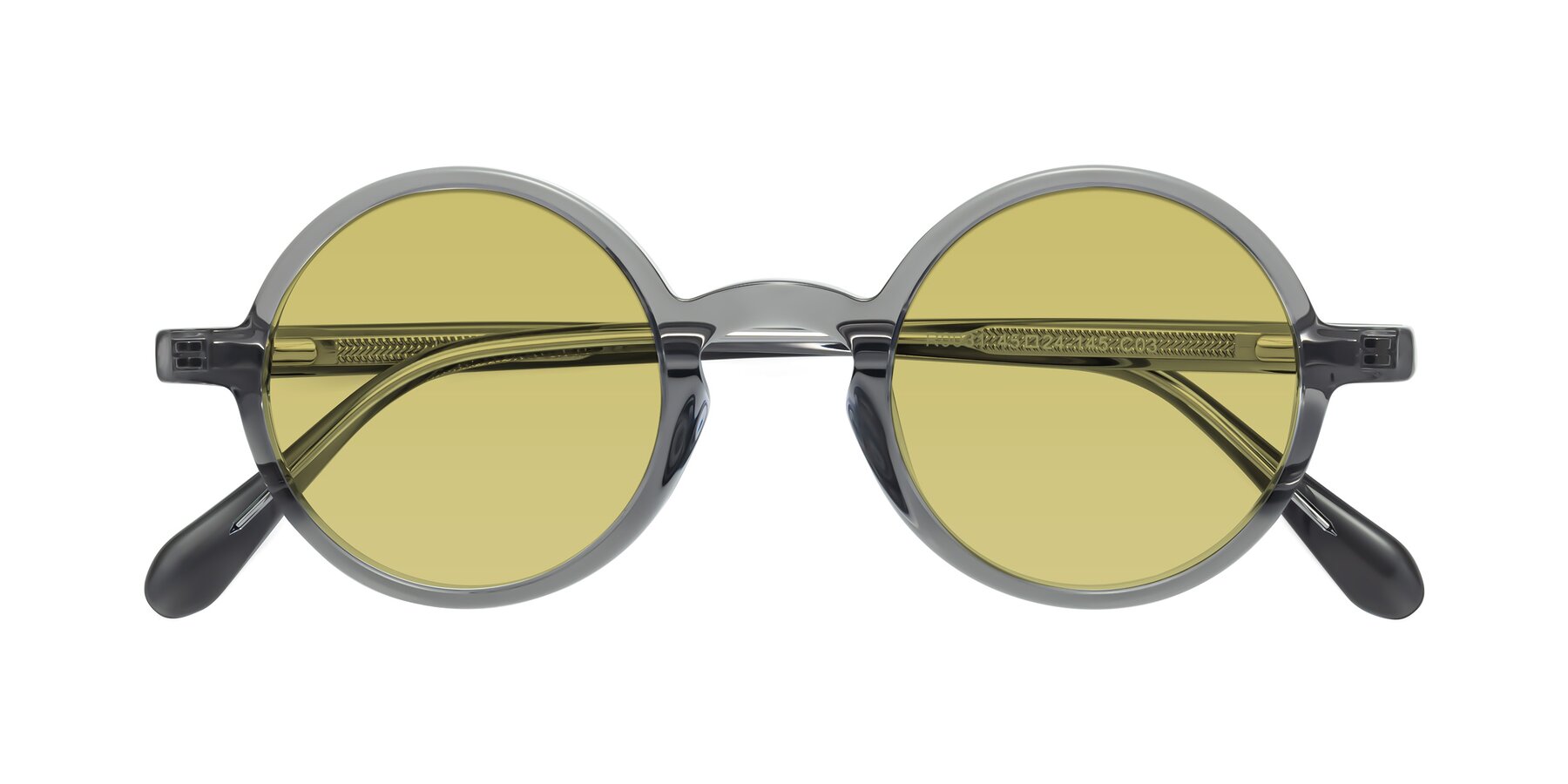 Folded Front of Juno in Transparent Gray with Medium Champagne Tinted Lenses