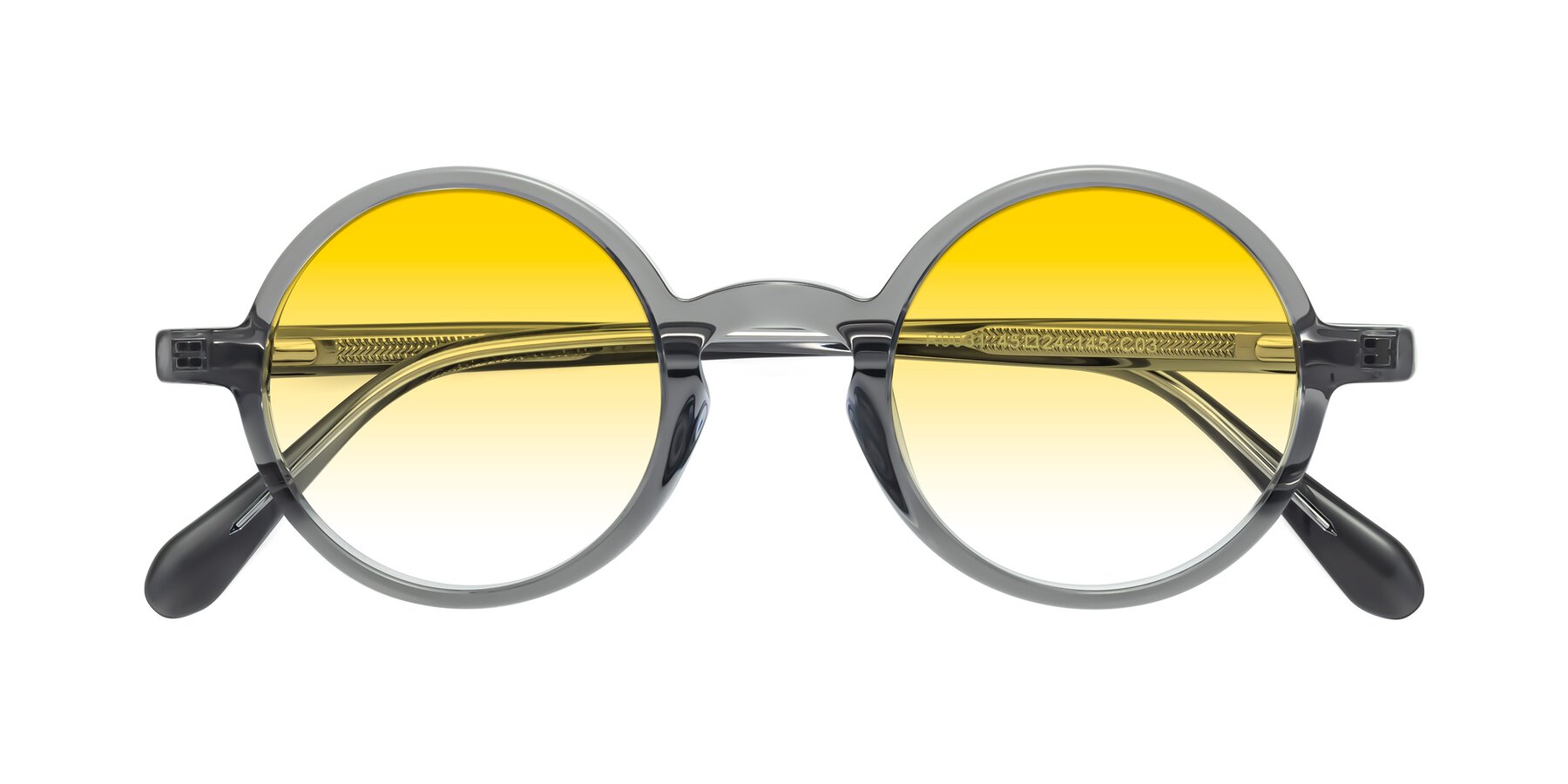 Folded Front of Juno in Transparent Gray with Yellow Gradient Lenses