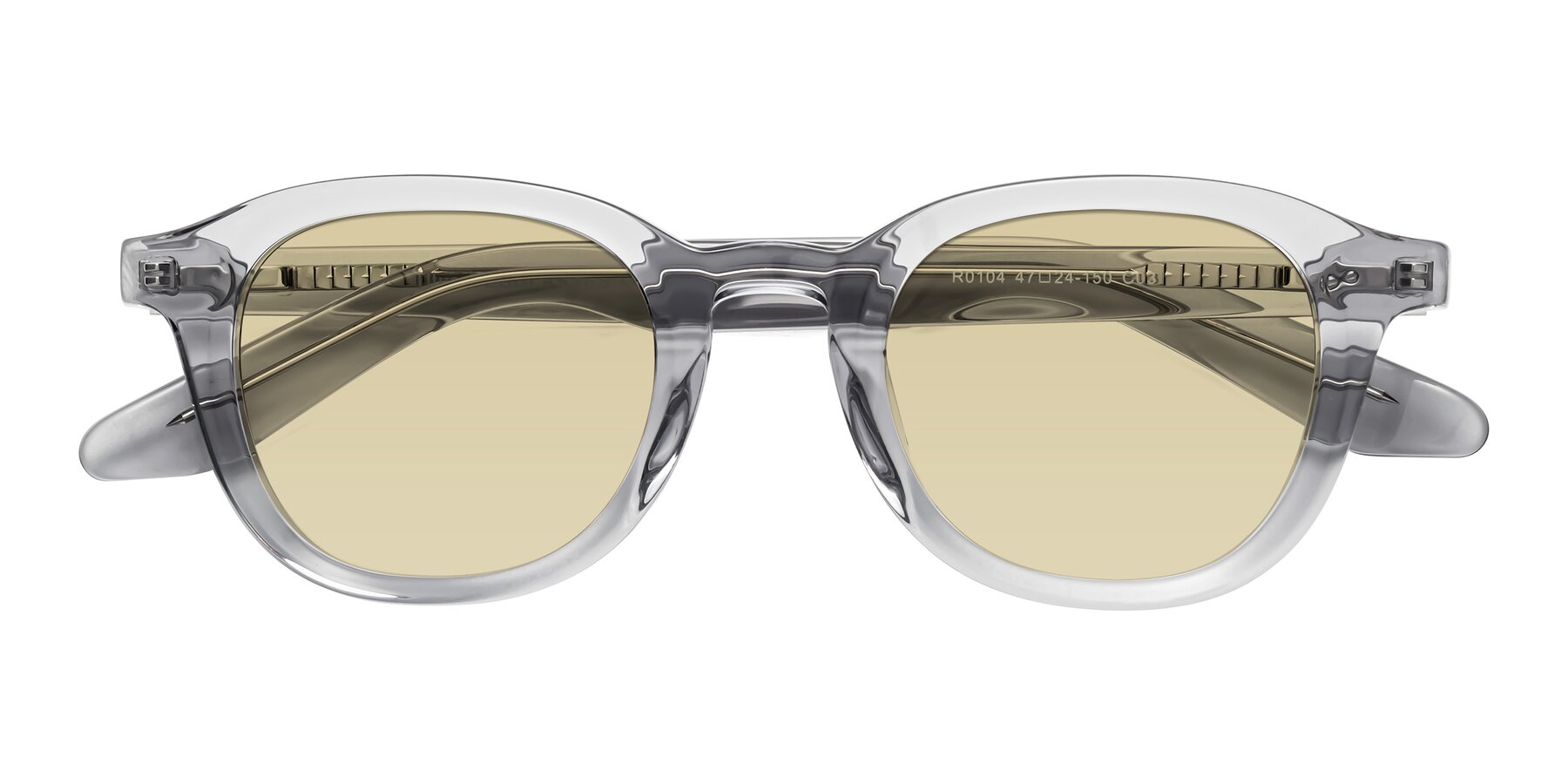 Folded Front of Titus in Transparent Gray with Light Champagne Tinted Lenses