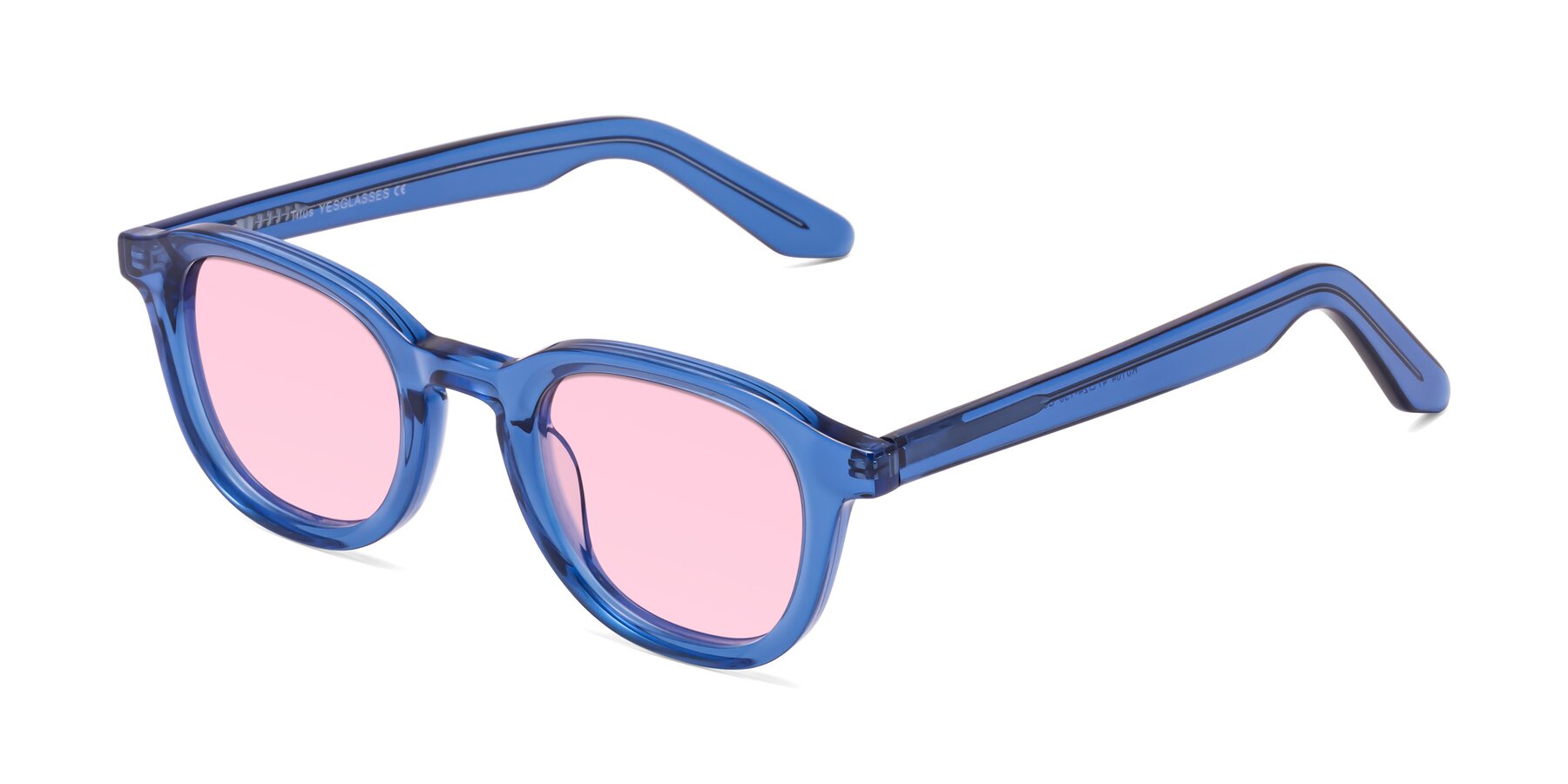 Angle of Titus in Translucent Blue with Light Pink Tinted Lenses