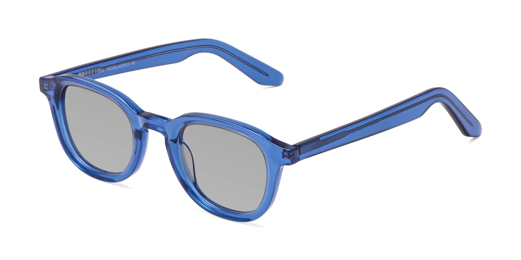 Angle of Titus in Translucent Blue with Light Gray Tinted Lenses