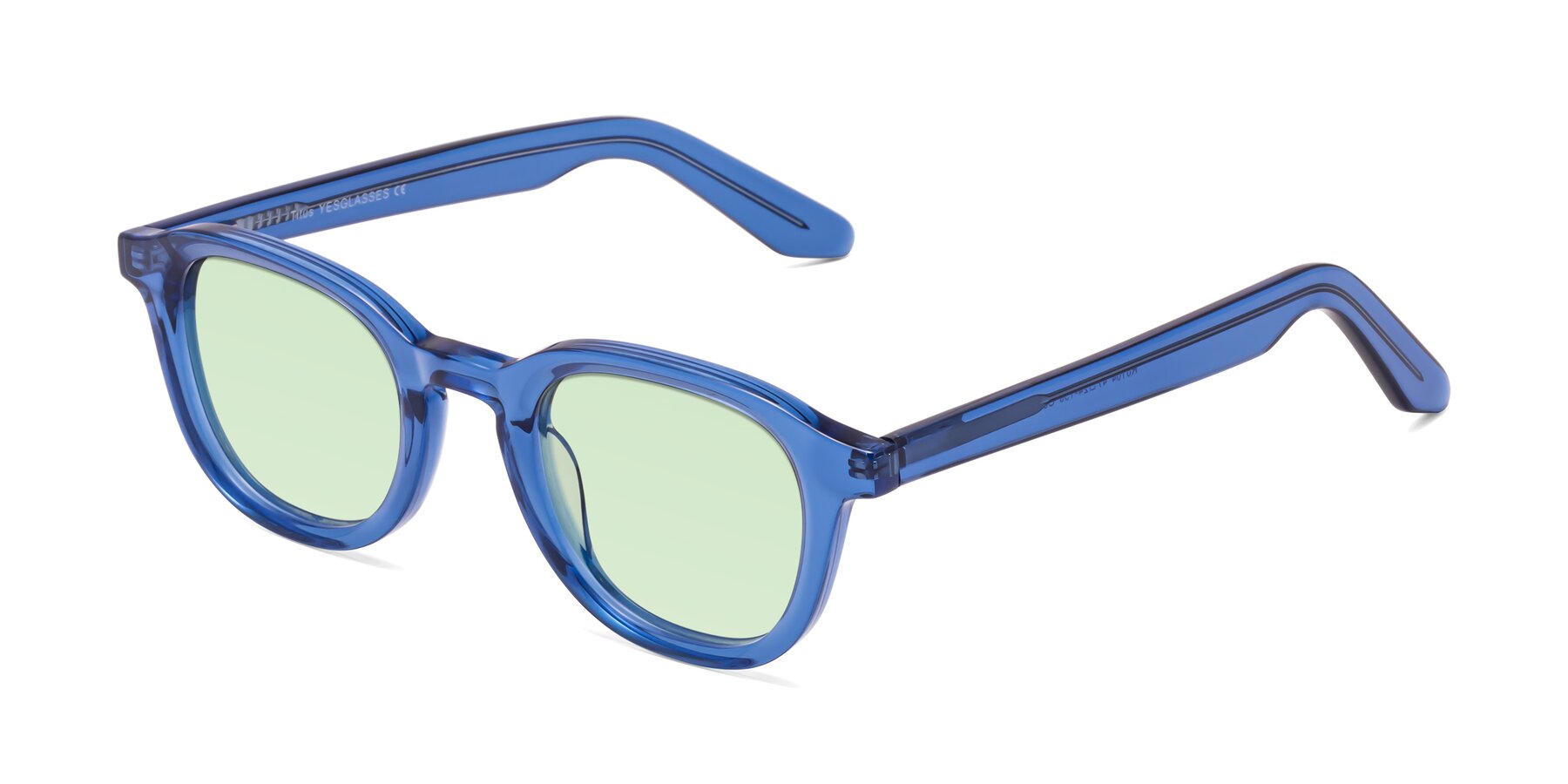 Angle of Titus in Translucent Blue with Light Green Tinted Lenses