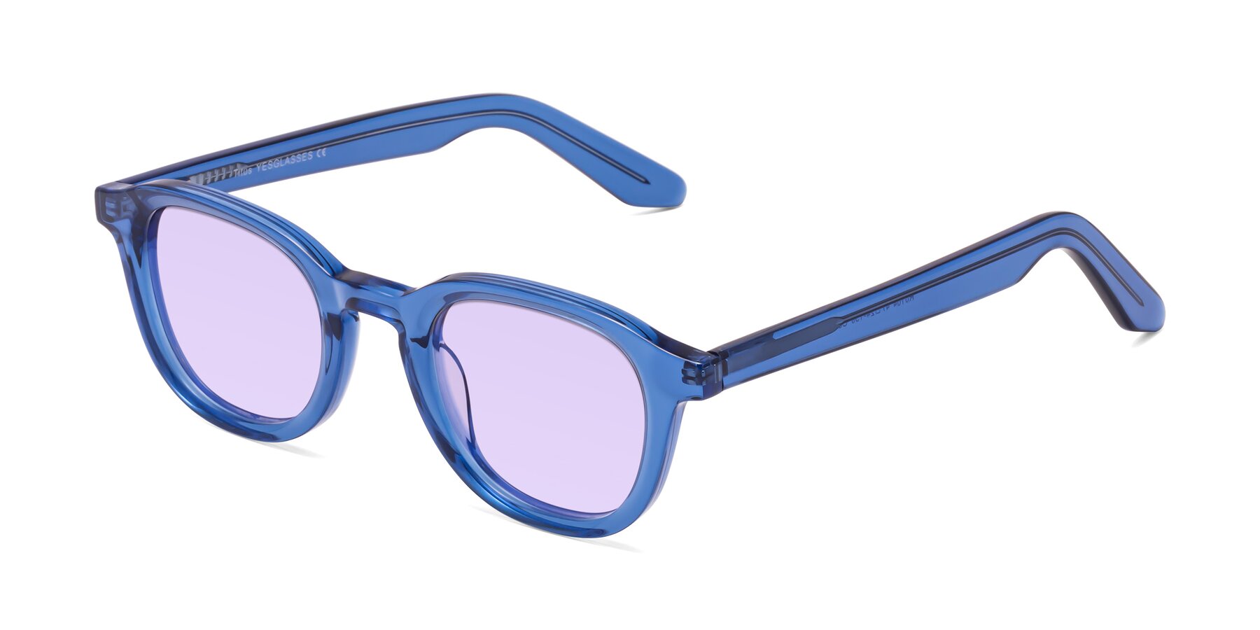 Angle of Titus in Translucent Blue with Light Purple Tinted Lenses