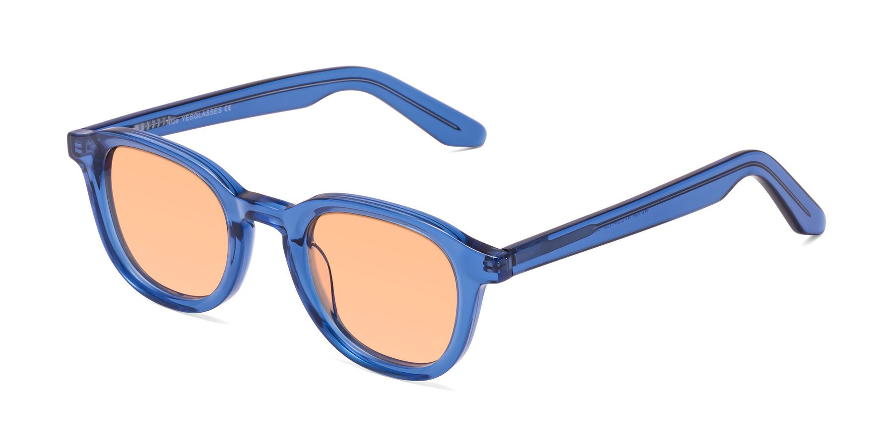 Angle of Titus in Translucent Blue with Light Orange Tinted Lenses