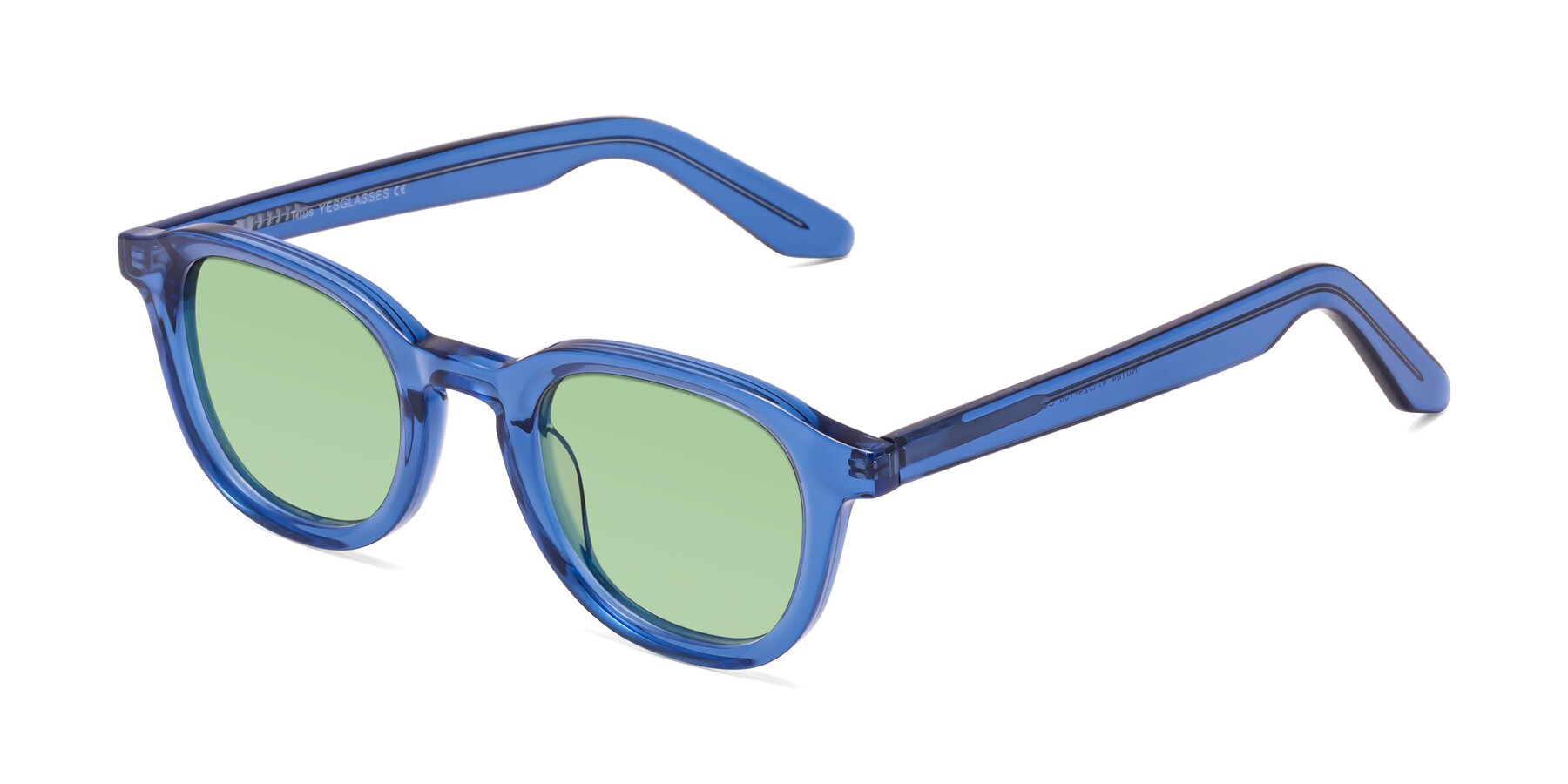 Angle of Titus in Translucent Blue with Medium Green Tinted Lenses