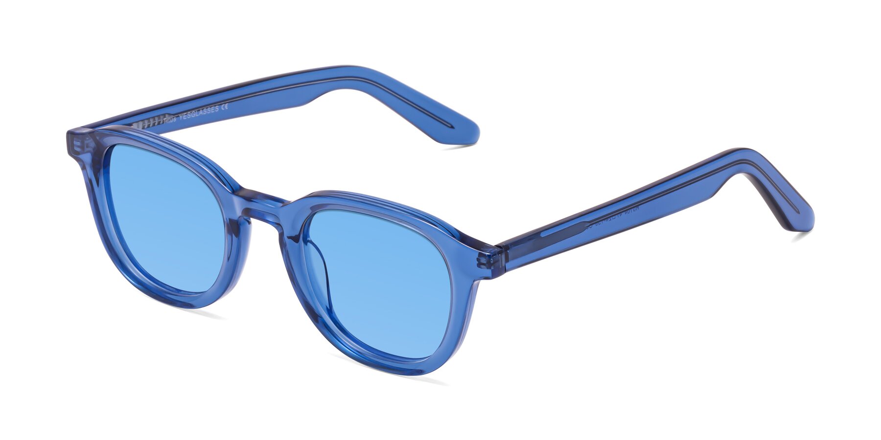 Angle of Titus in Translucent Blue with Medium Blue Tinted Lenses