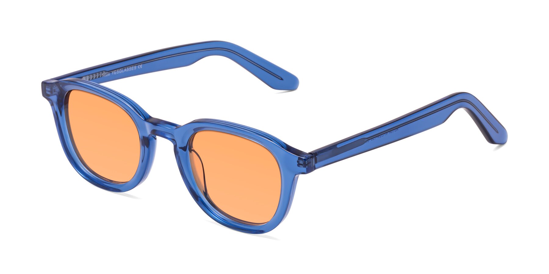 Angle of Titus in Translucent Blue with Medium Orange Tinted Lenses