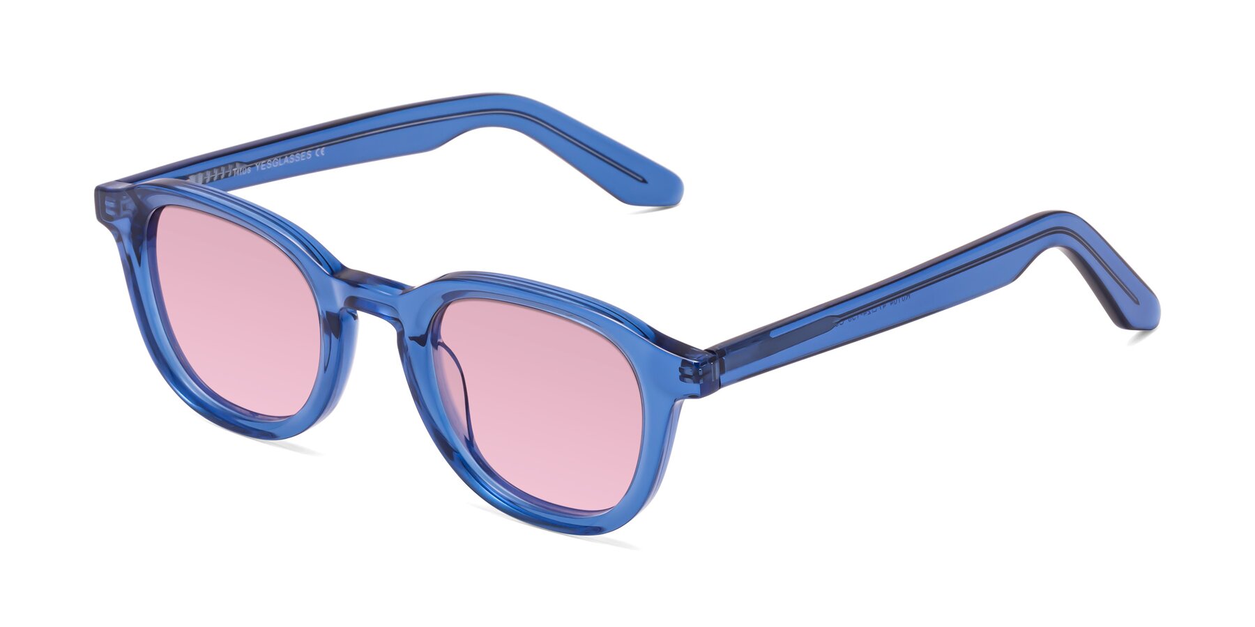 Angle of Titus in Translucent Blue with Light Wine Tinted Lenses