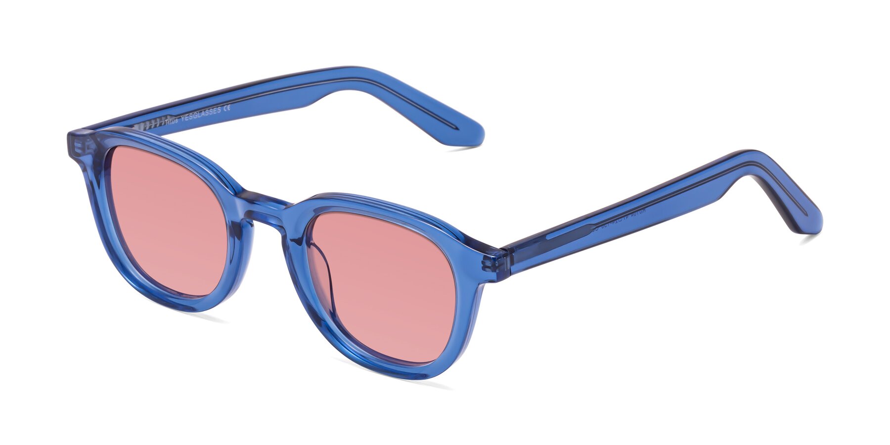 Angle of Titus in Translucent Blue with Medium Garnet Tinted Lenses