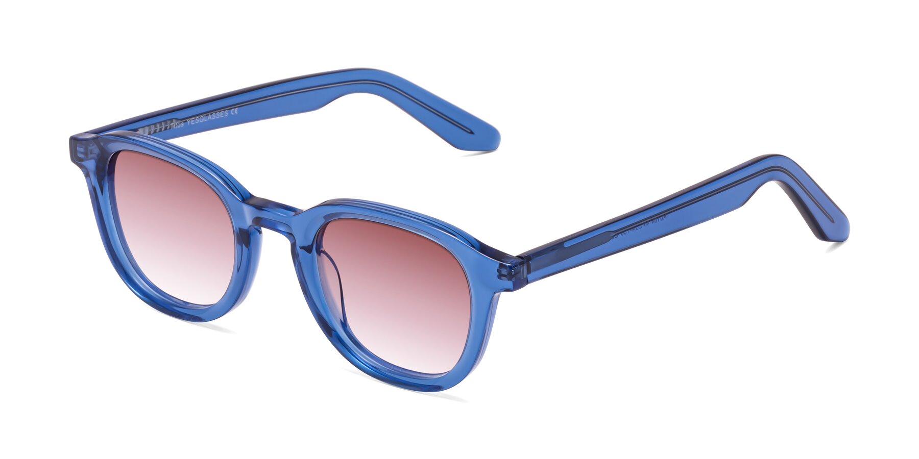 Angle of Titus in Translucent Blue with Garnet Gradient Lenses