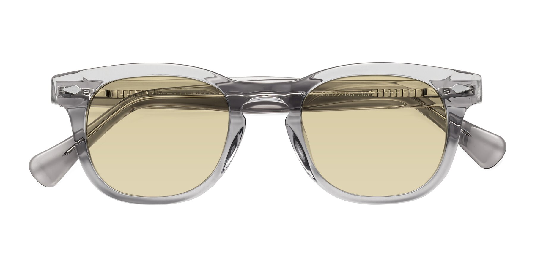 Folded Front of Tanna in Transparent Gray with Light Champagne Tinted Lenses