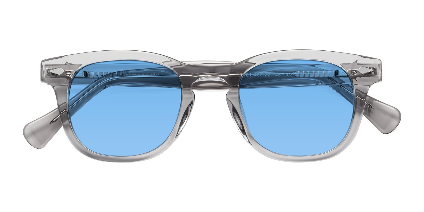 Folded Front of Tanna in Transparent Gray with Medium Blue Tinted Lenses