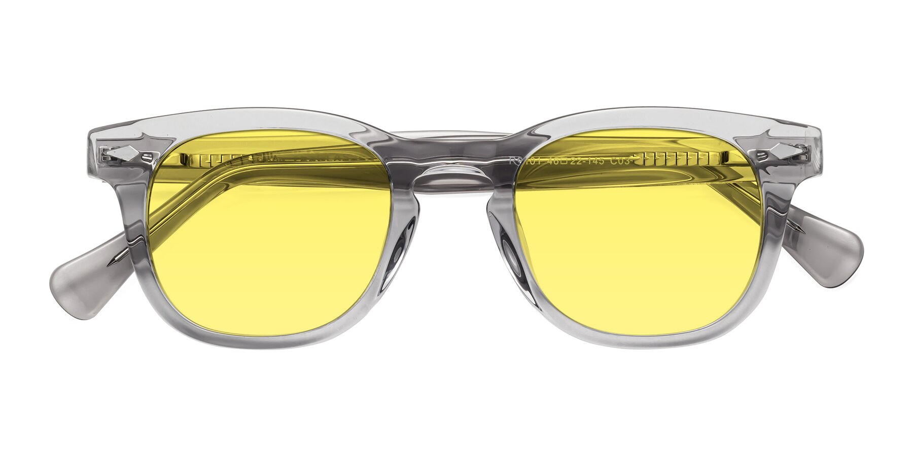 Folded Front of Tanna in Transparent Gray with Medium Yellow Tinted Lenses