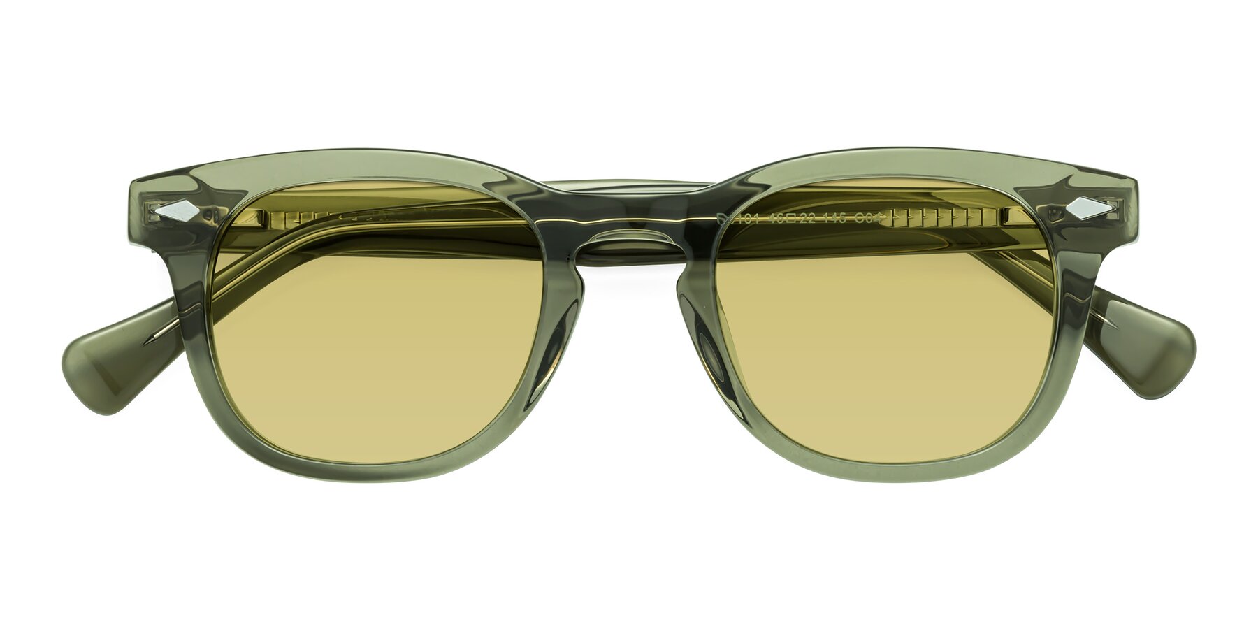 Folded Front of Tanna in Transparent Green with Medium Champagne Tinted Lenses