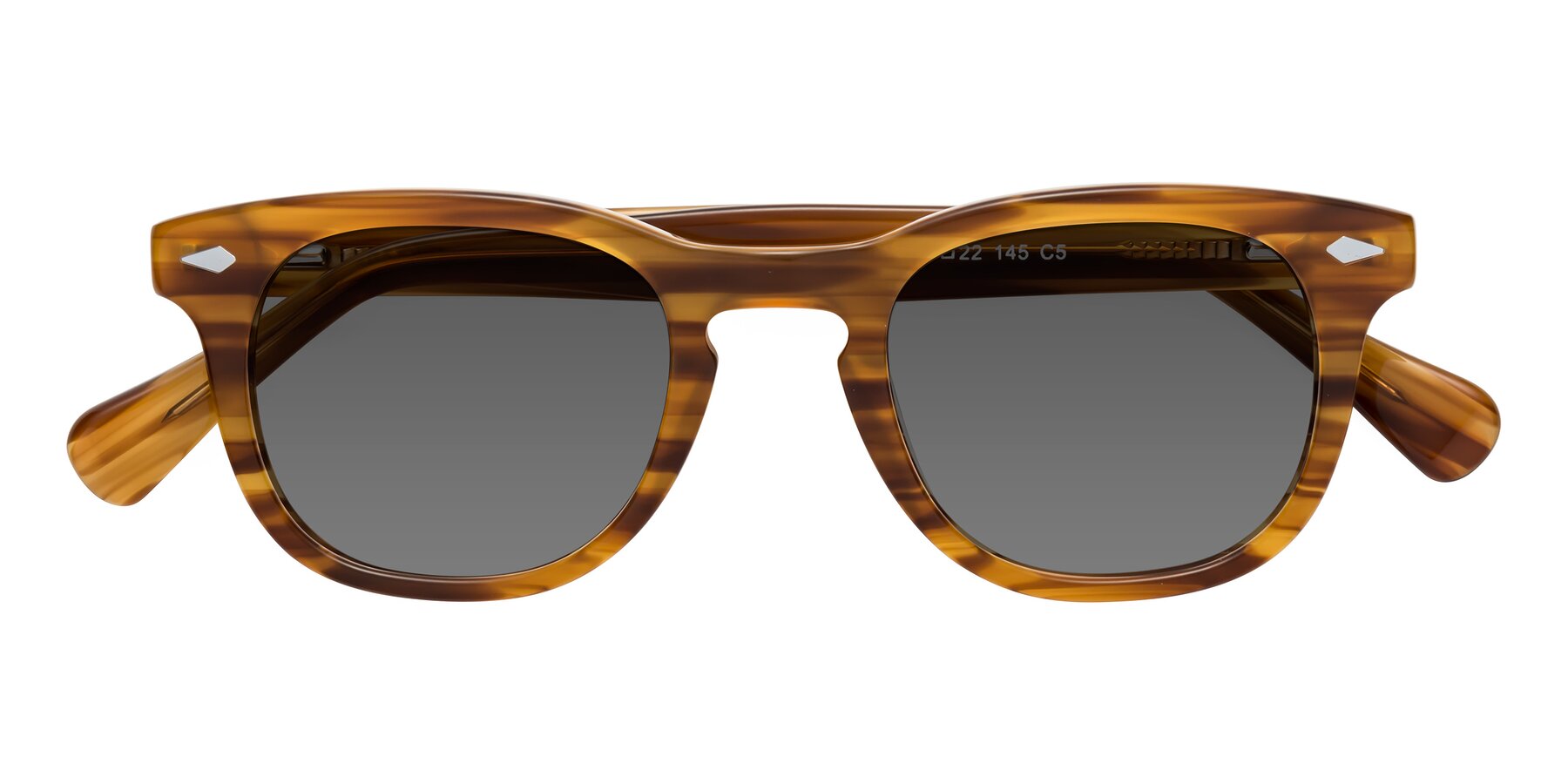 Folded Front of Tanna in Amber Striped with Medium Gray Tinted Lenses