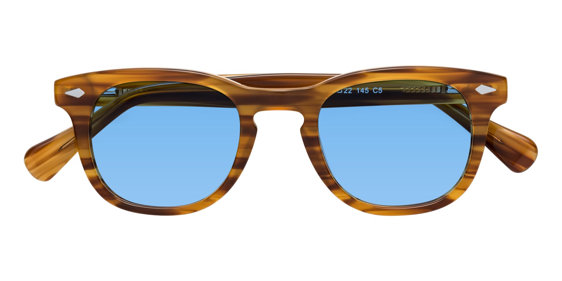 Folded Front of Tanna in Amber Striped with Medium Blue Tinted Lenses