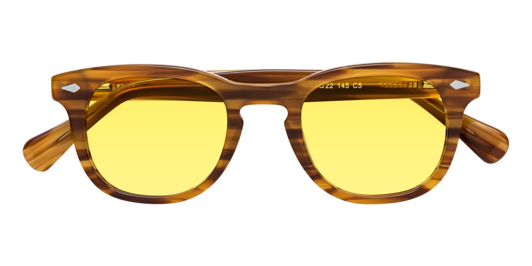 Folded Front of Tanna in Amber Striped with Medium Yellow Tinted Lenses