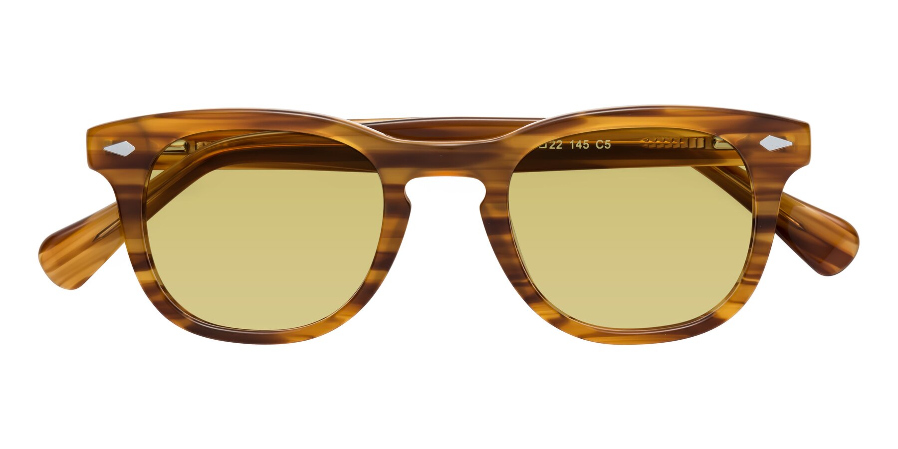 Folded Front of Tanna in Amber Striped with Medium Champagne Tinted Lenses