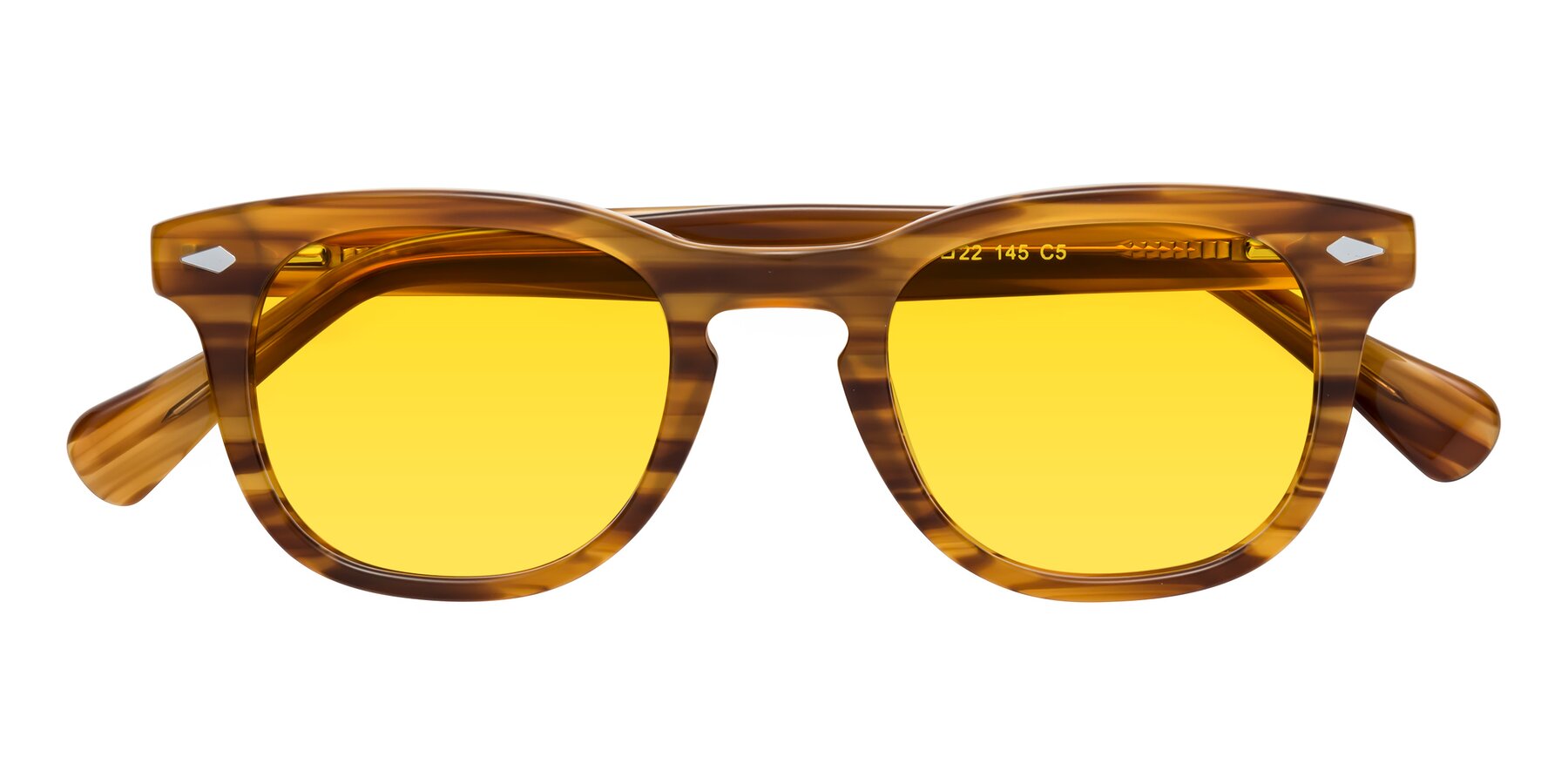 Folded Front of Tanna in Amber Striped with Yellow Tinted Lenses