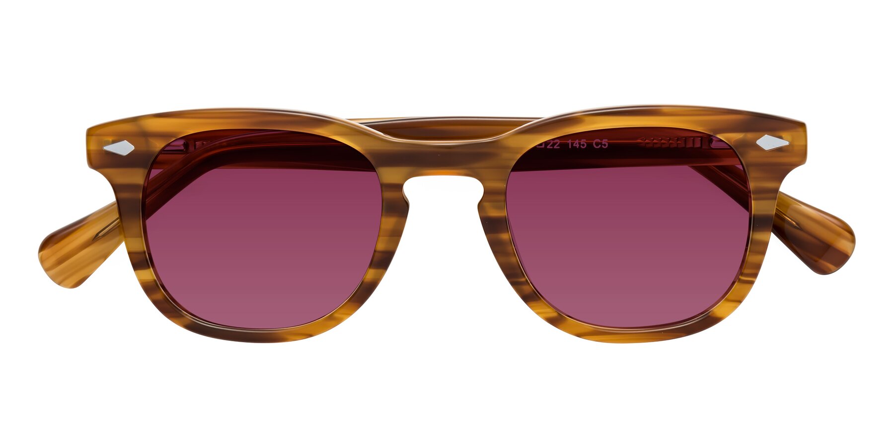 Folded Front of Tanna in Amber Striped with Wine Tinted Lenses