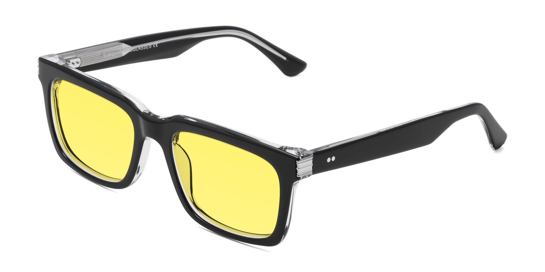 Angle of Evergreen in Black-Clear with Medium Yellow Tinted Lenses