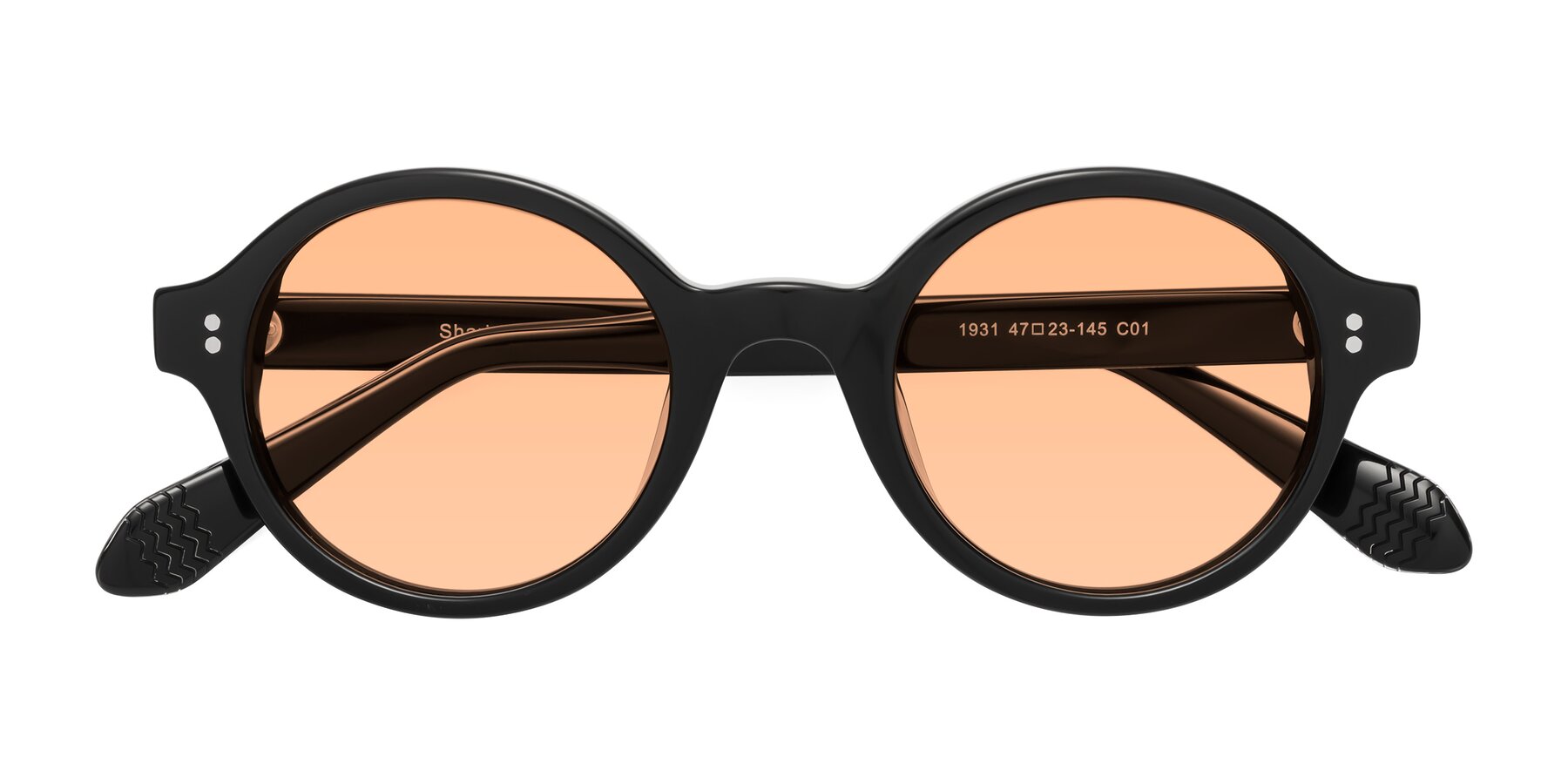 Folded Front of Shari in Black with Light Orange Tinted Lenses