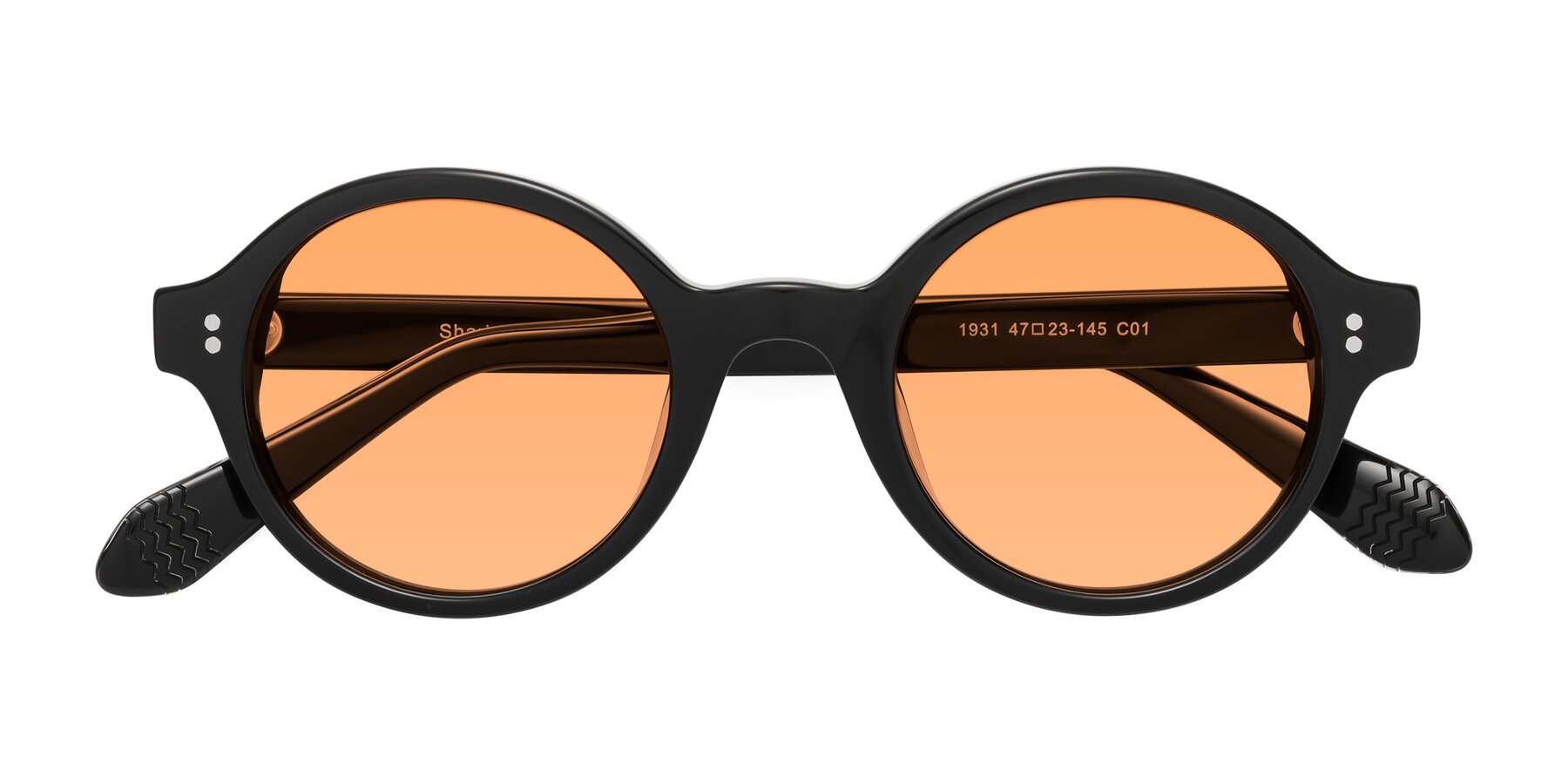 Folded Front of Shari in Black with Medium Orange Tinted Lenses