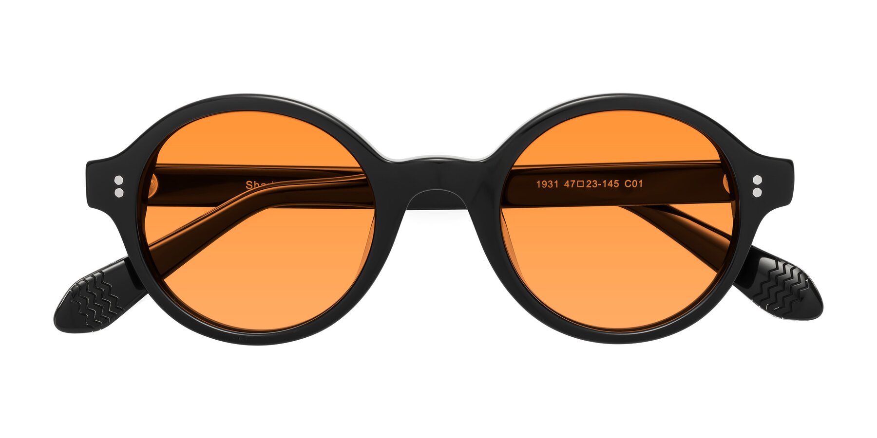 Folded Front of Shari in Black with Orange Tinted Lenses