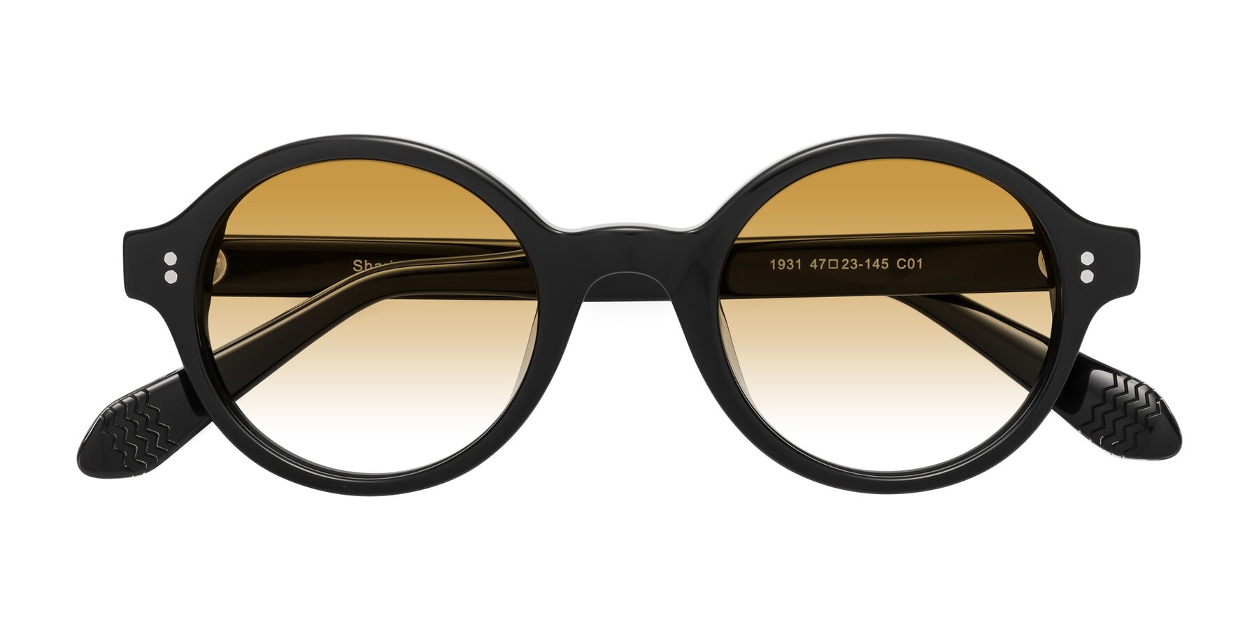 Folded Front of Shari in Black with Champagne Gradient Lenses