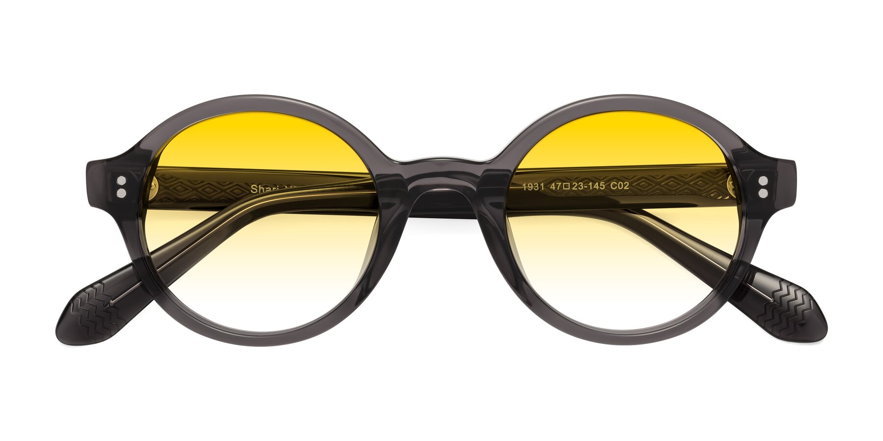 Folded Front of Shari in Dark Gray with Yellow Gradient Lenses