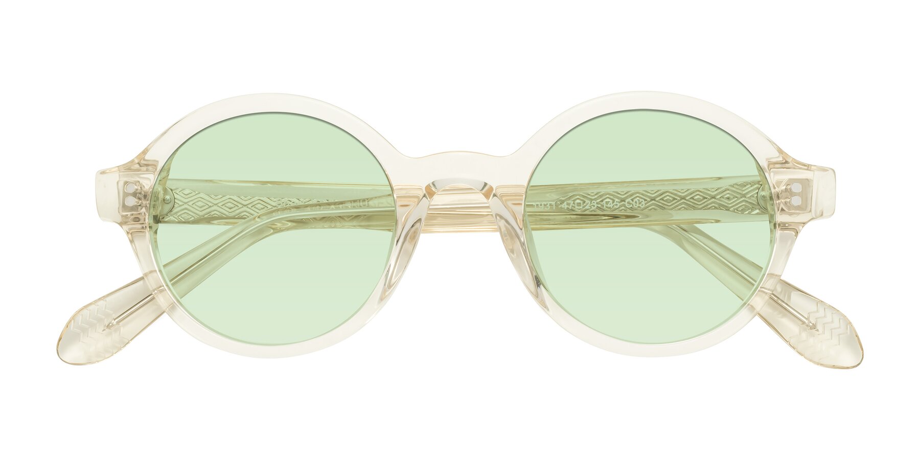 Folded Front of Shari in Champagne with Light Green Tinted Lenses