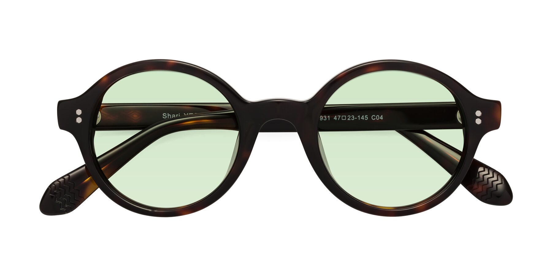 Folded Front of Shari in Dark Tortoise with Light Green Tinted Lenses