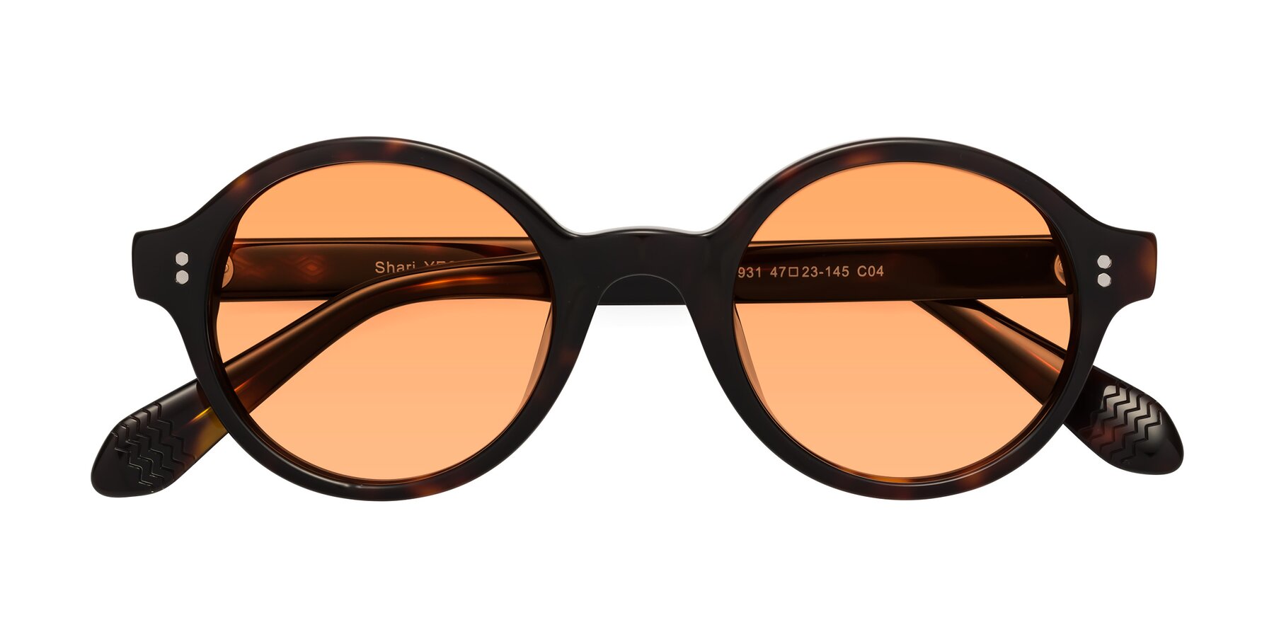 Folded Front of Shari in Dark Tortoise with Medium Orange Tinted Lenses