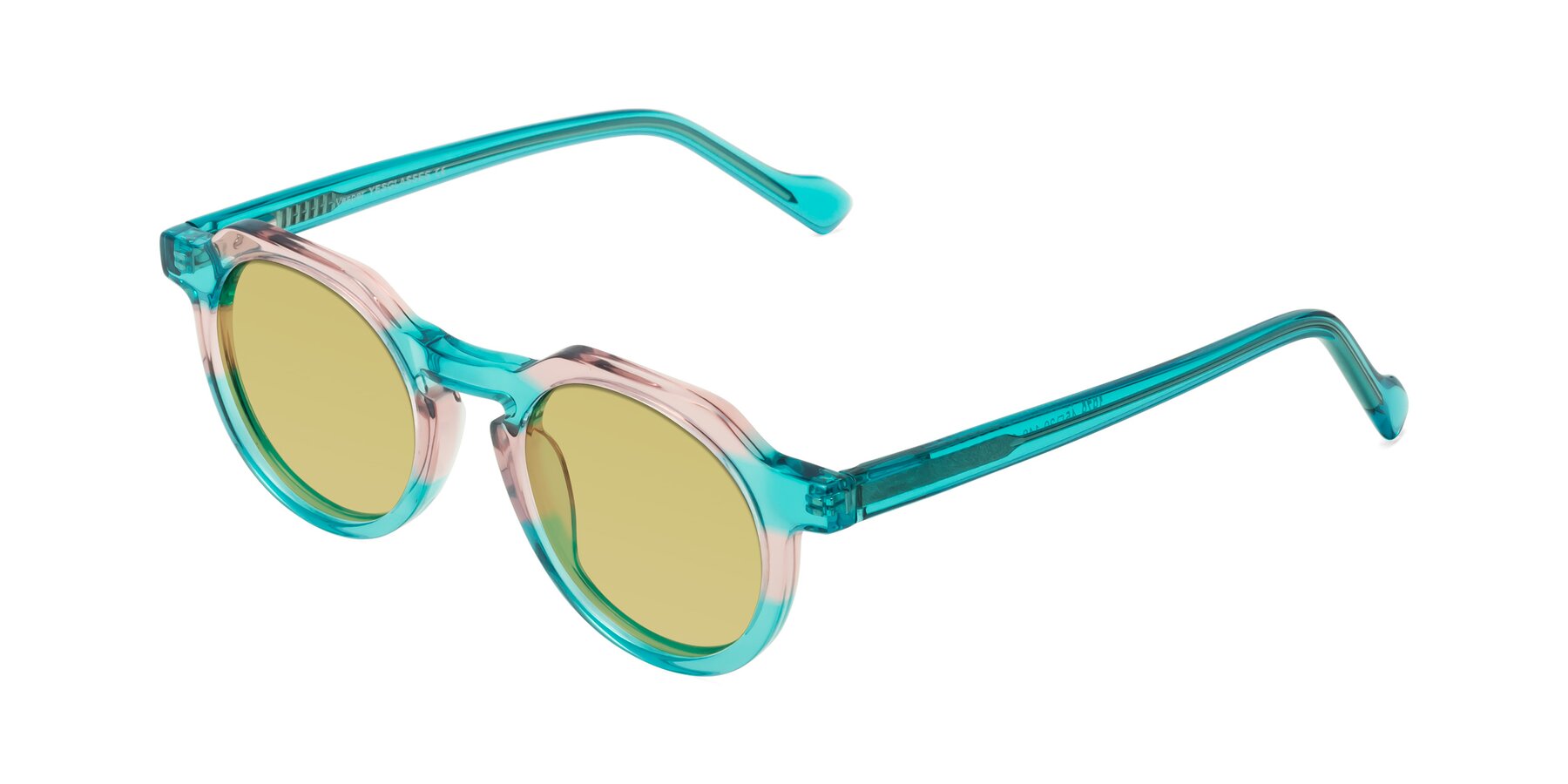 Angle of Vesper in Green-Pink with Medium Champagne Tinted Lenses