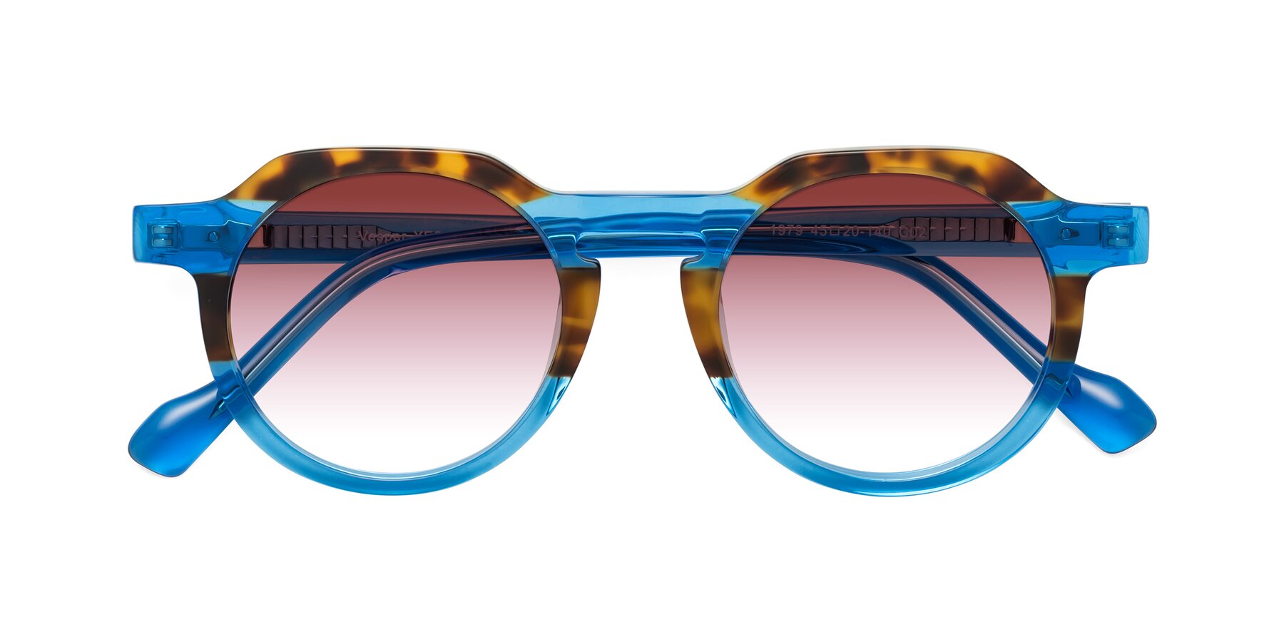 Folded Front of Vesper in Tortoise-Blue with Garnet Gradient Lenses