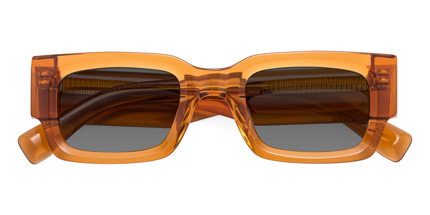 Folded Front of Kirn in Maple Syrup with Medium Gray Tinted Lenses