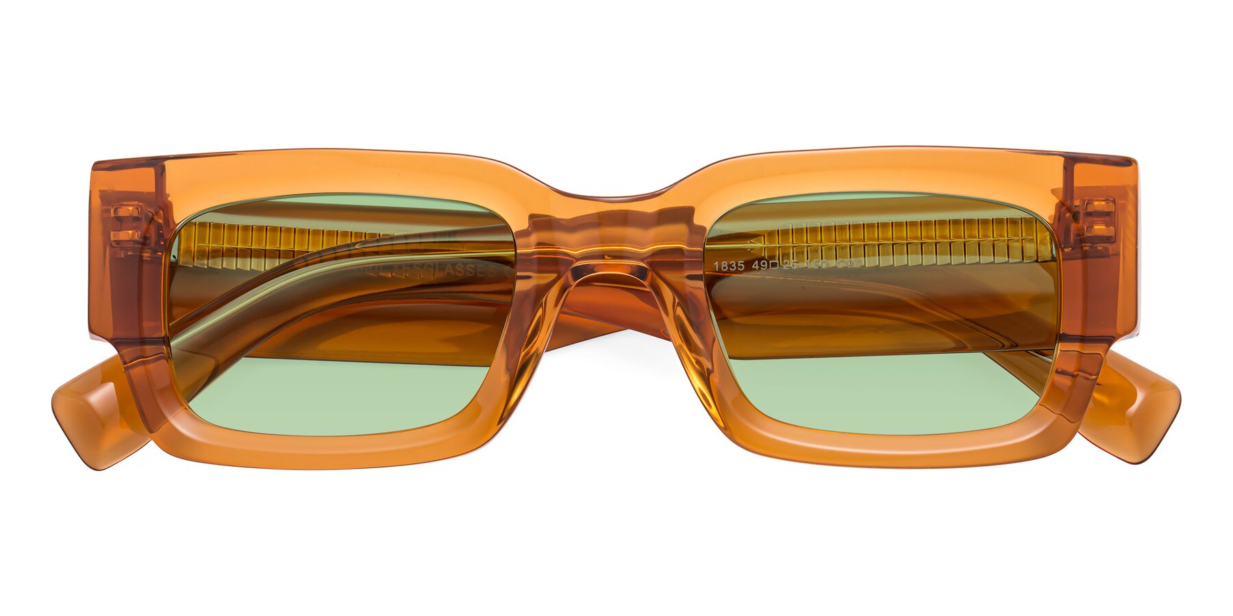 Folded Front of Kirn in Maple Syrup with Medium Green Tinted Lenses