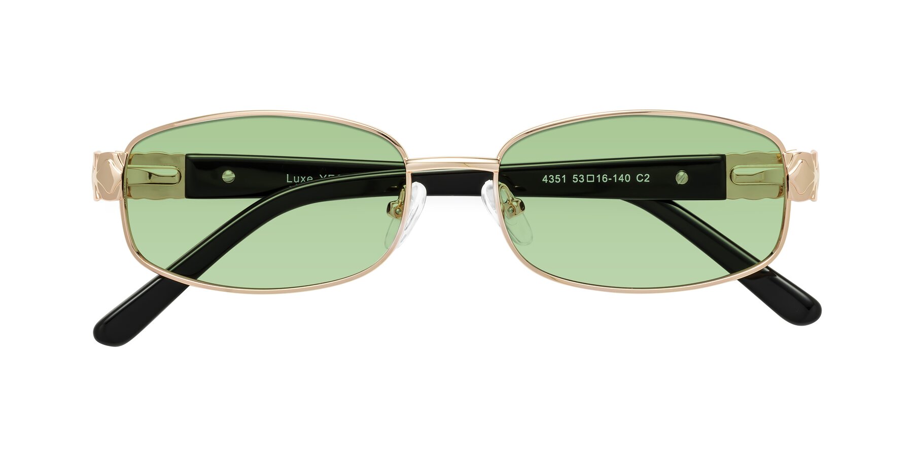 Folded Front of Luxe in Rose Gold with Medium Green Tinted Lenses