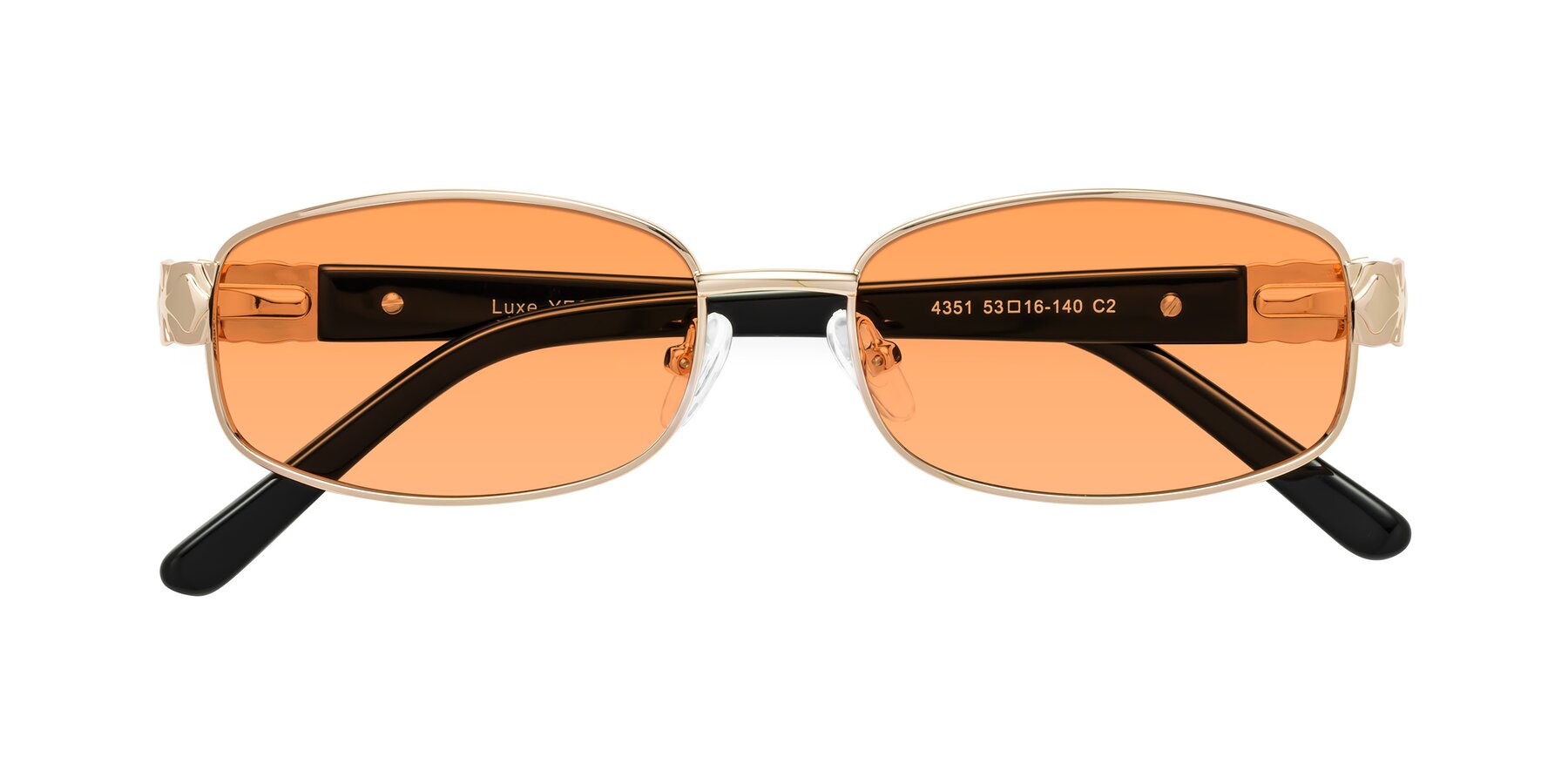 Folded Front of Luxe in Rose Gold with Medium Orange Tinted Lenses