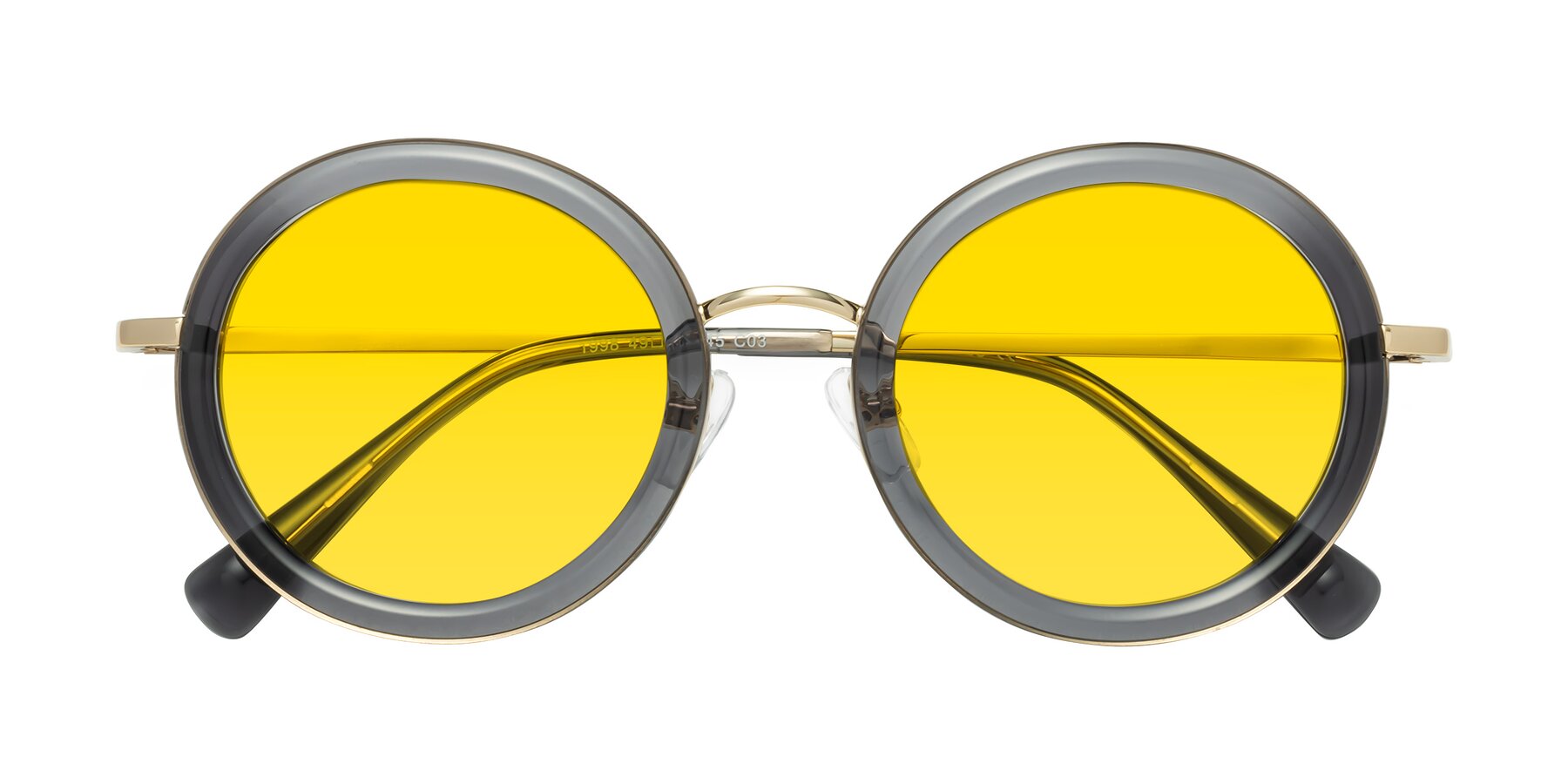 Folded Front of Club in Gray-Gold with Yellow Tinted Lenses