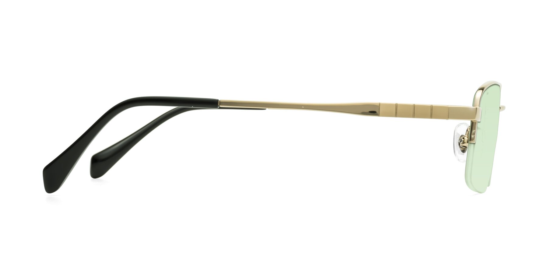 Side of Profile in Gold with Light Green Tinted Lenses