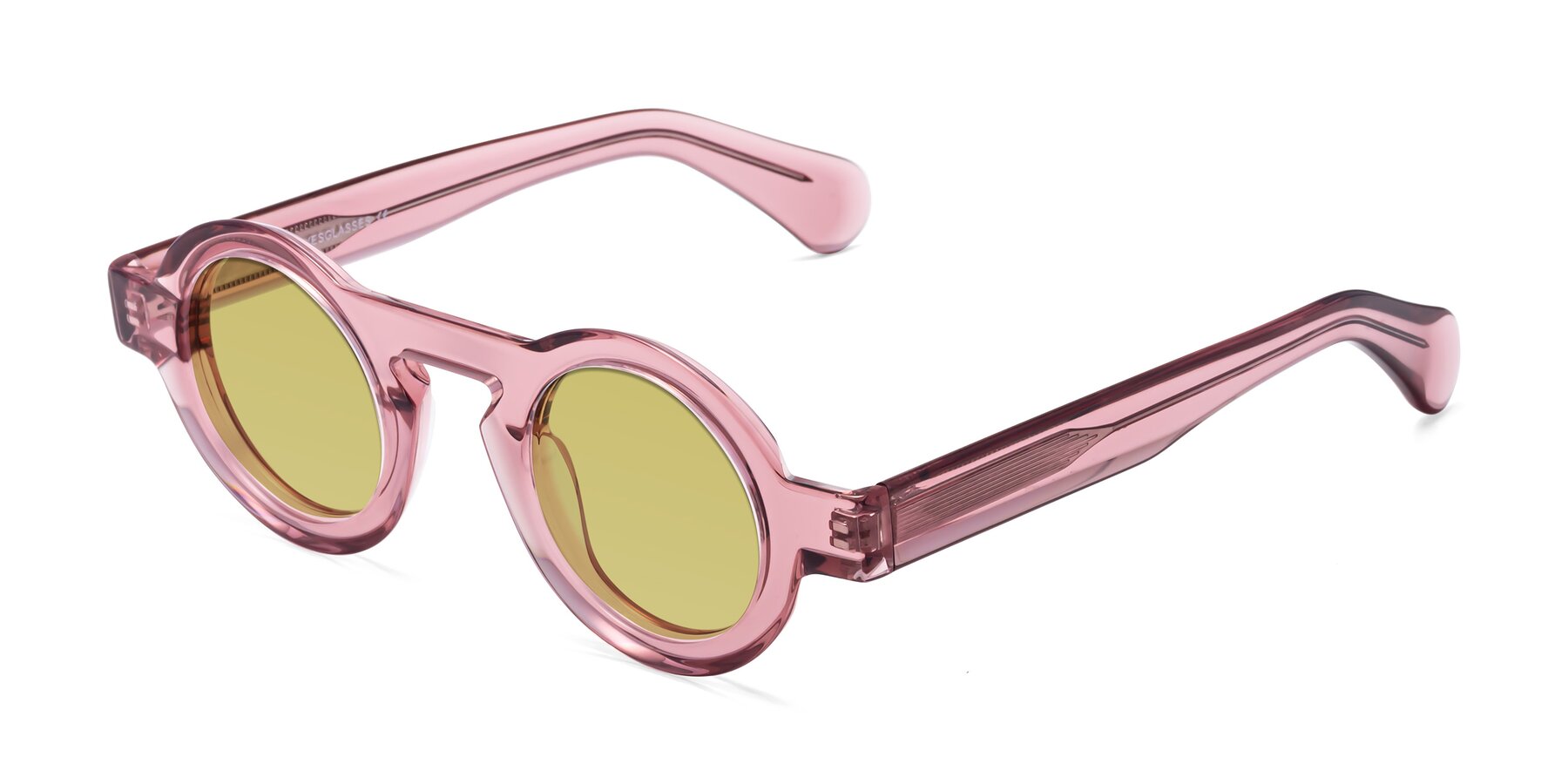 Angle of Oboe in Translucent Pink with Medium Champagne Tinted Lenses