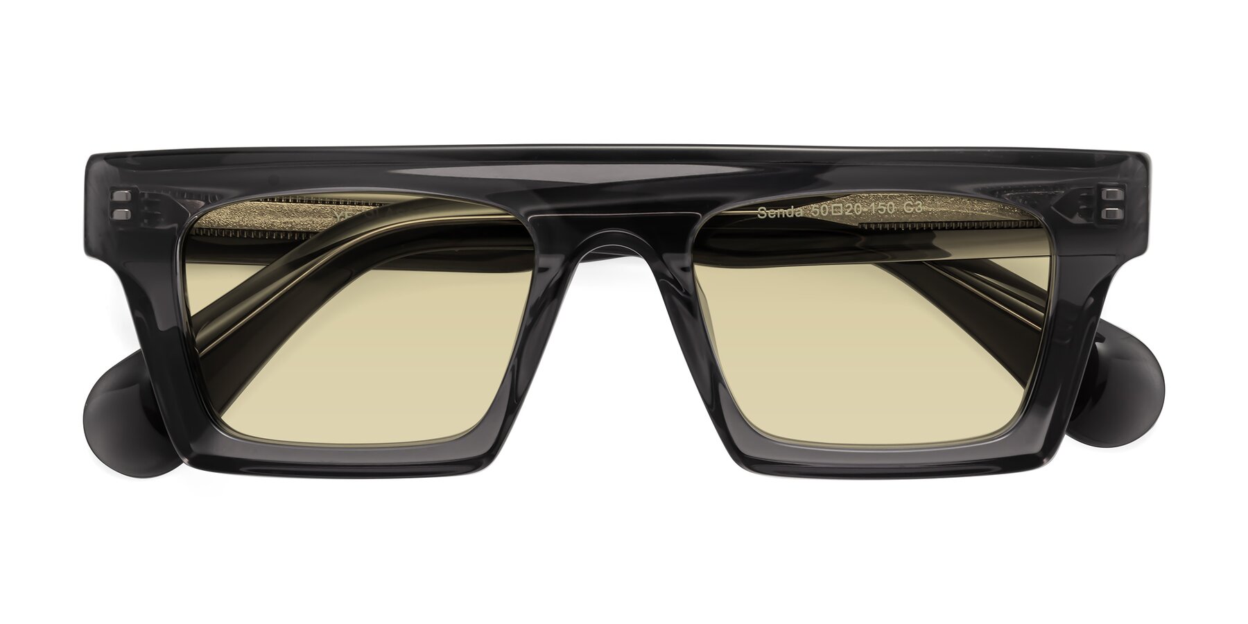 Folded Front of Senda in Translucent Gray with Light Champagne Tinted Lenses