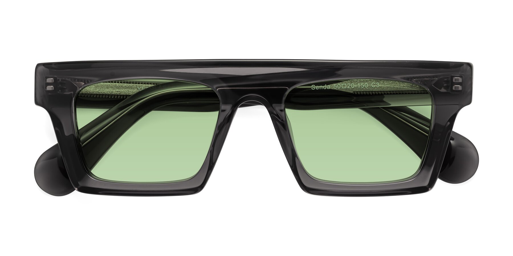 Folded Front of Senda in Translucent Gray with Medium Green Tinted Lenses