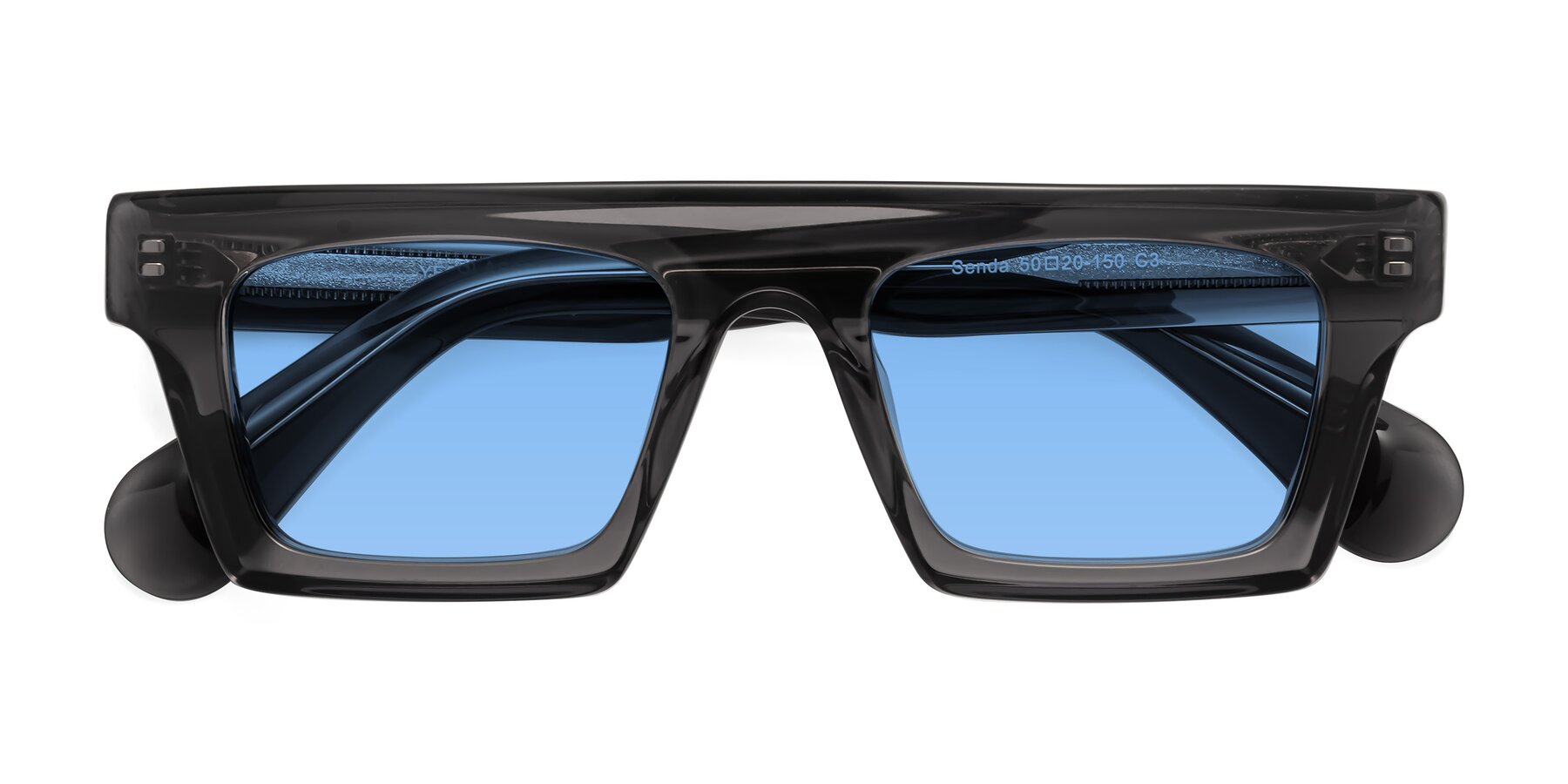 Folded Front of Senda in Translucent Gray with Medium Blue Tinted Lenses