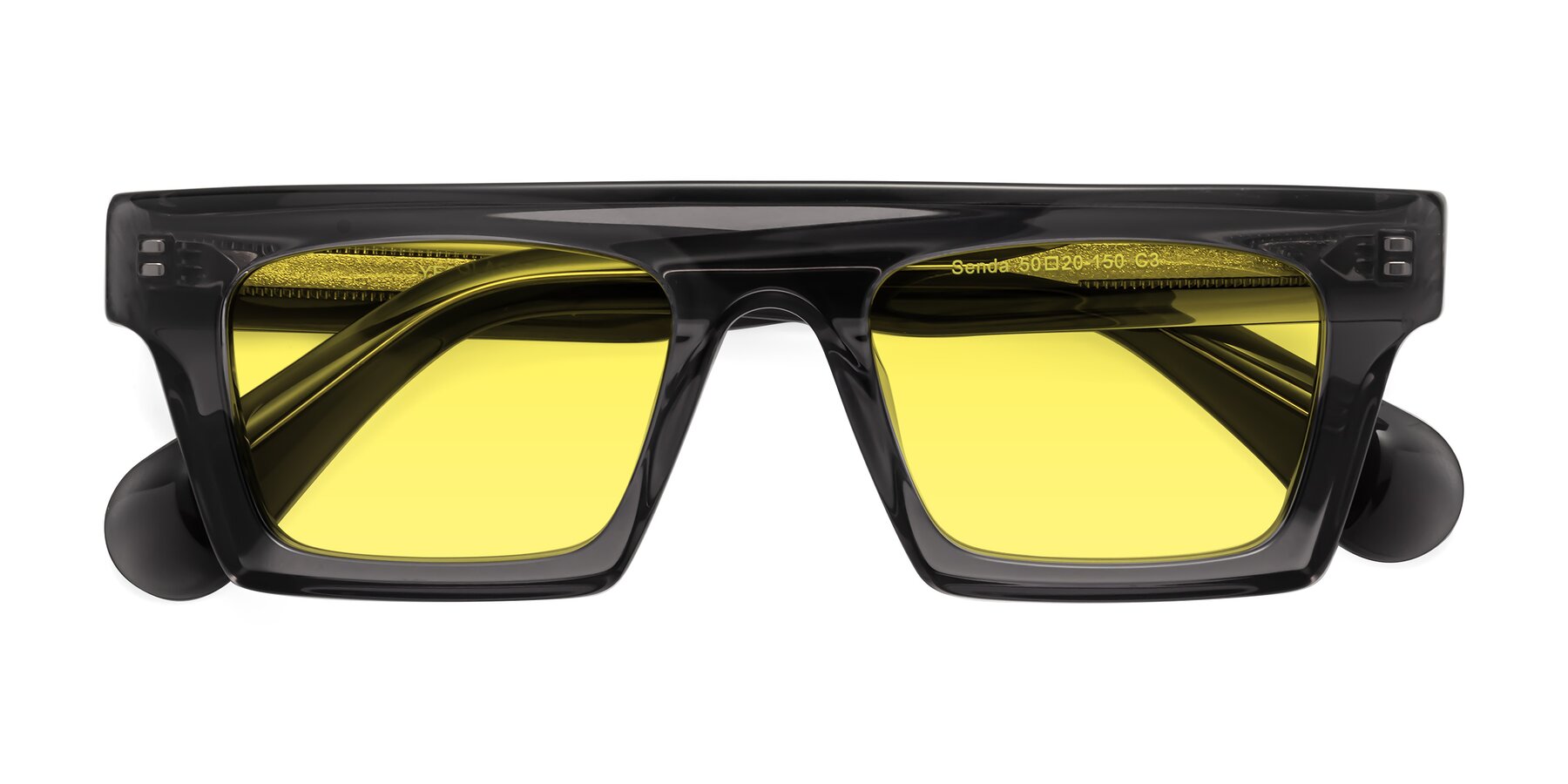Folded Front of Senda in Translucent Gray with Medium Yellow Tinted Lenses