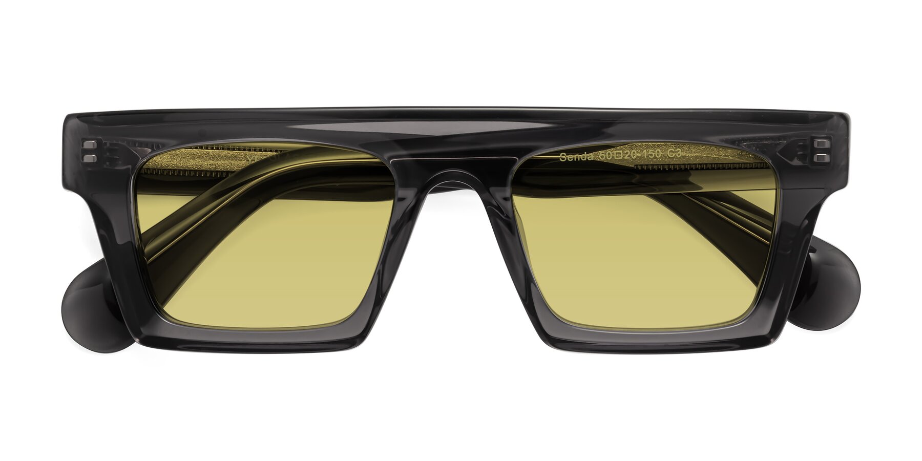 Folded Front of Senda in Translucent Gray with Medium Champagne Tinted Lenses