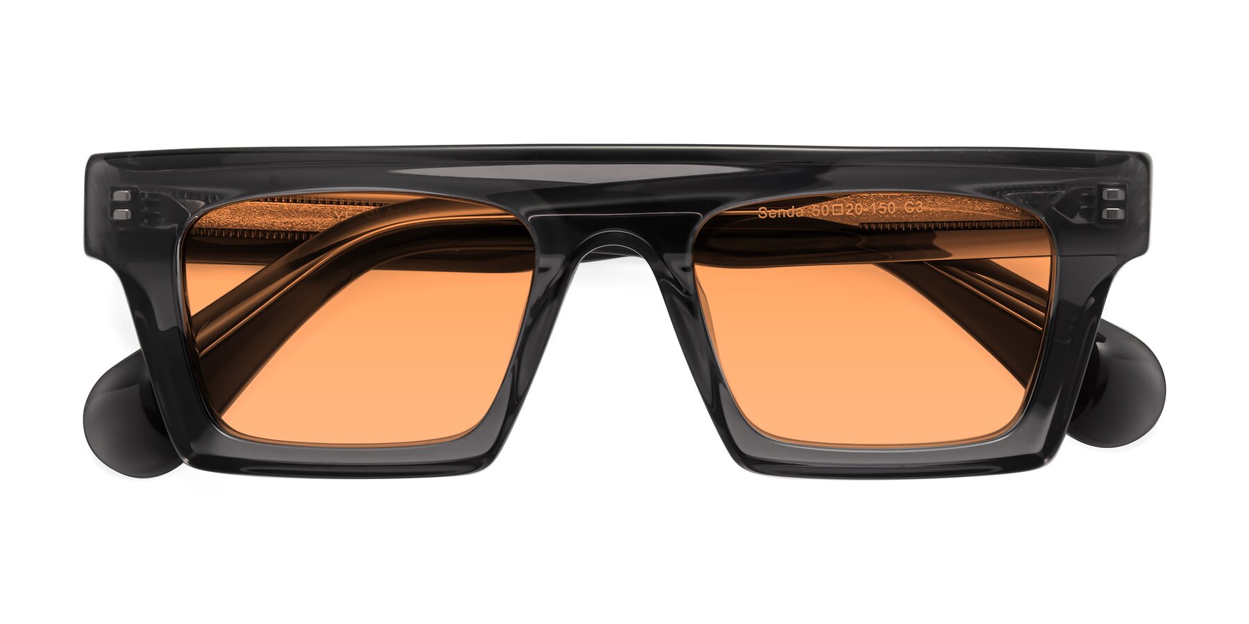 Folded Front of Senda in Translucent Gray with Medium Orange Tinted Lenses